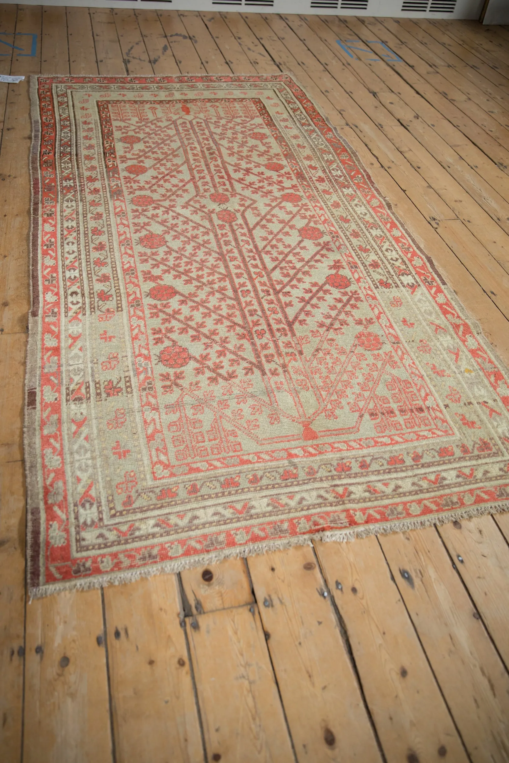 4.5x8.5 Antique Distressed Khotan Rug