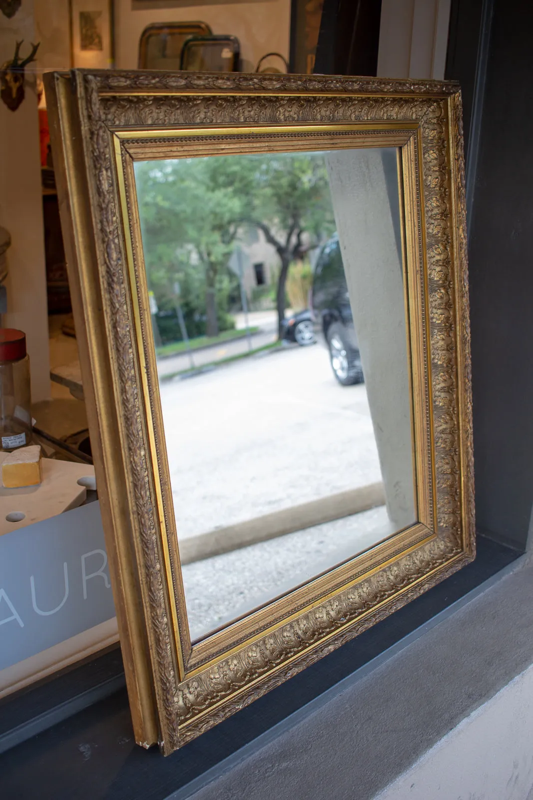 Antique French Gilt Mirror with Leaf Carvings