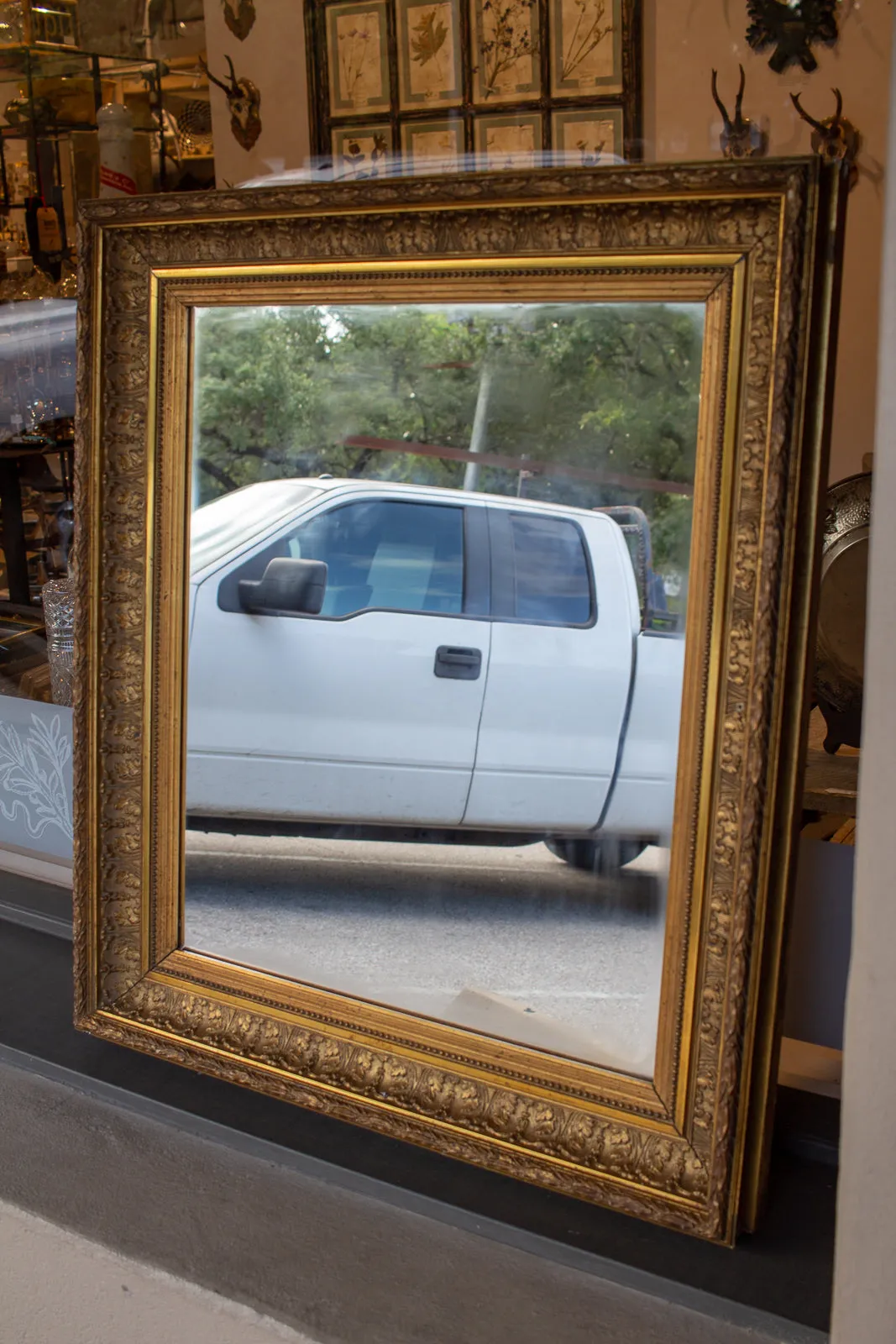 Antique French Gilt Mirror with Leaf Carvings