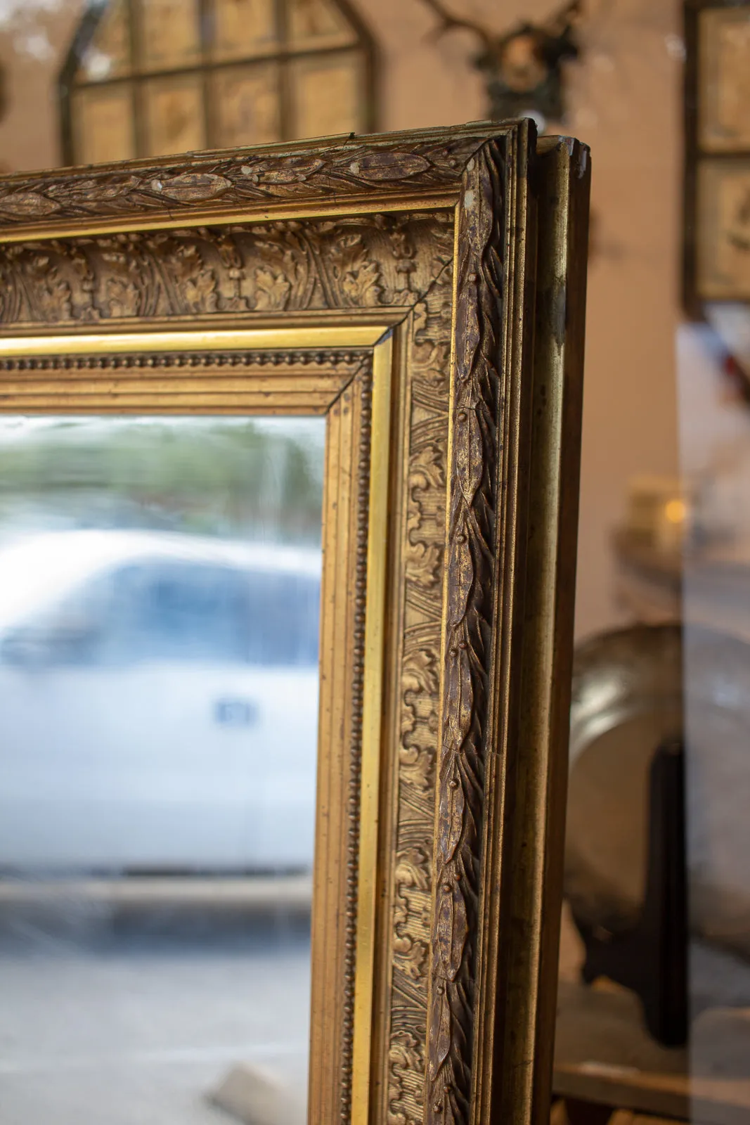 Antique French Gilt Mirror with Leaf Carvings