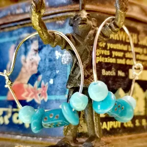 Antique glass beads on handmade silver hoops