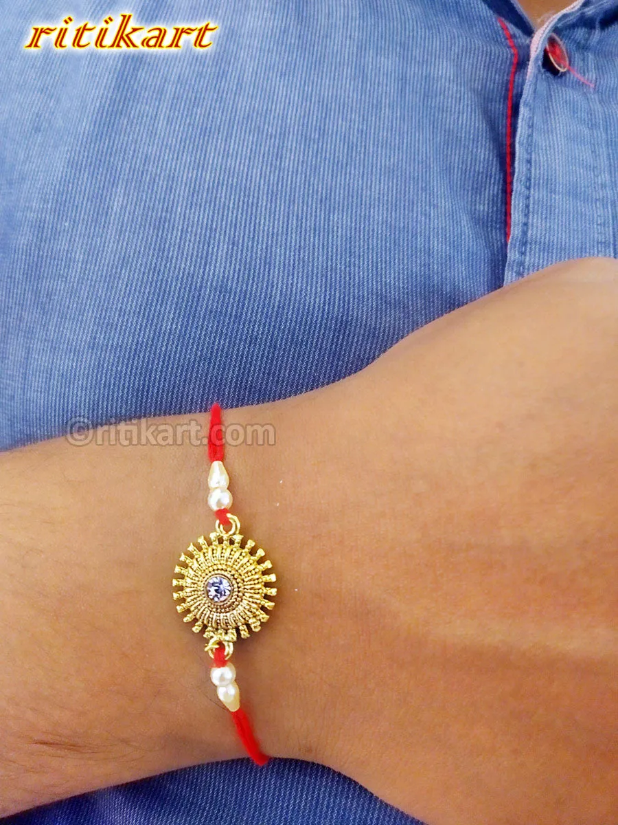 Designer Golden Flower with White Stone Rakhi