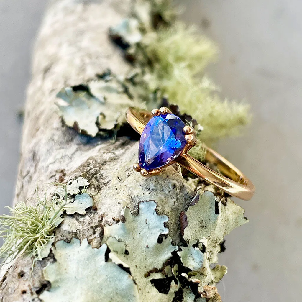 Elegant Double Claw Solitaire Pear Tanzanite Ring
