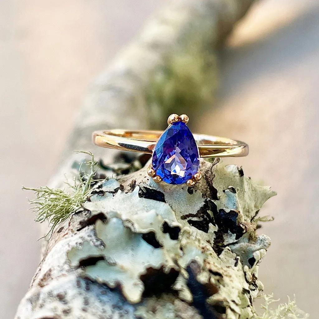 Elegant Double Claw Solitaire Pear Tanzanite Ring
