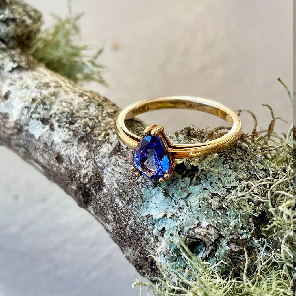Elegant Double Claw Solitaire Pear Tanzanite Ring