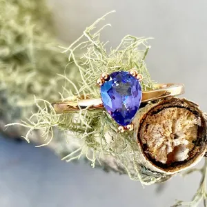 Elegant Double Claw Solitaire Pear Tanzanite Ring