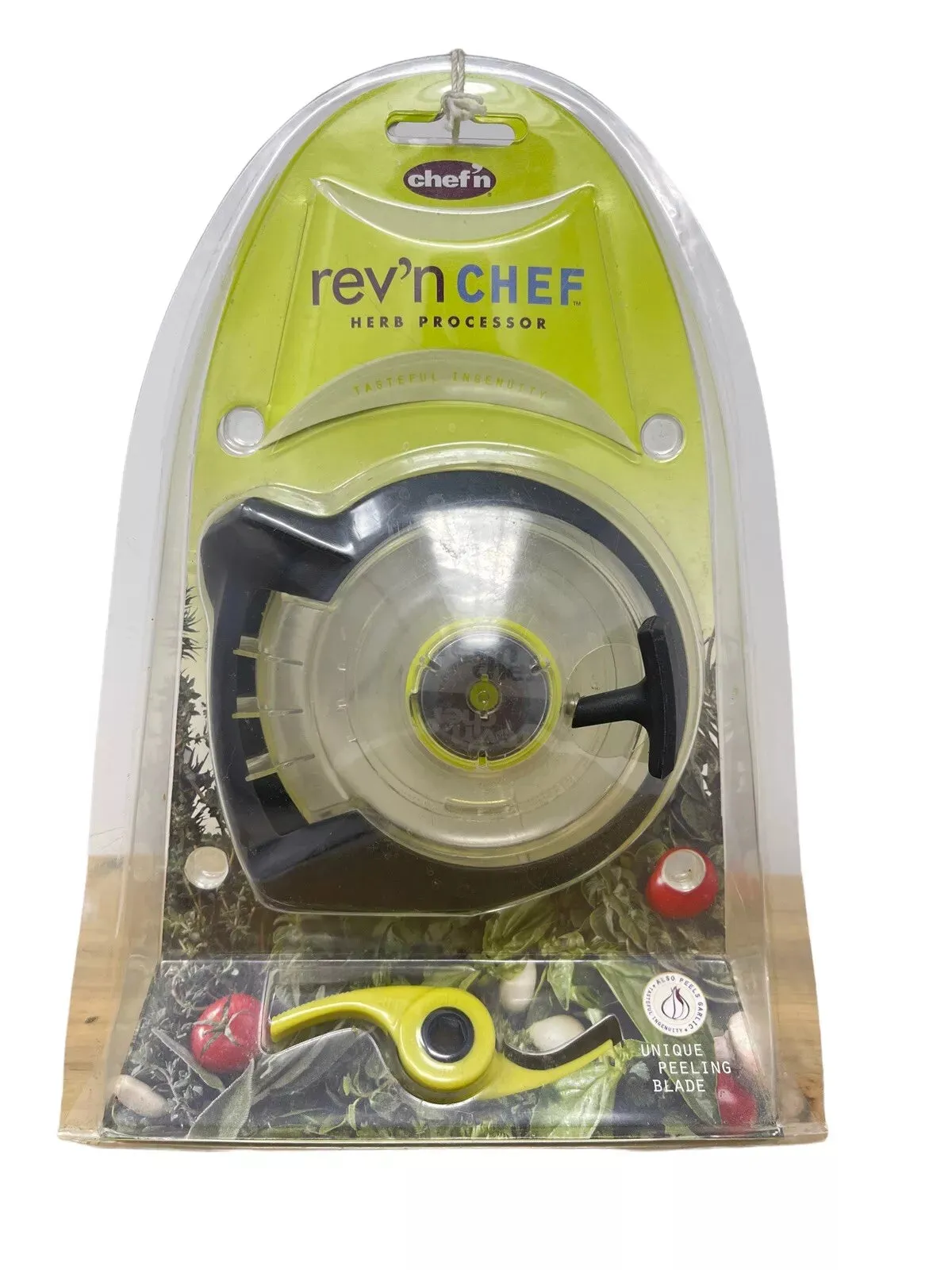 New Chef'n Rev'n Chef Herb Food Processor & Garlic Peeler with Pull Cord Spin! Just Toss in your herbs or garlic & pull the cord to process!