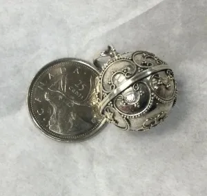 Ornate Silver Musical Ball Pendant