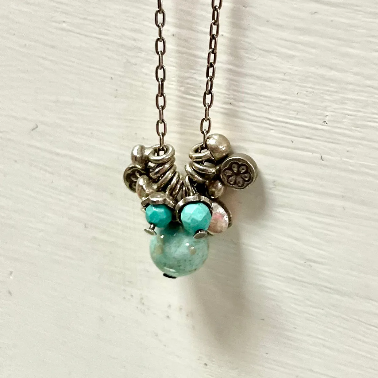 Silver Necklace with Ornate Silver and Stone Charms 30"