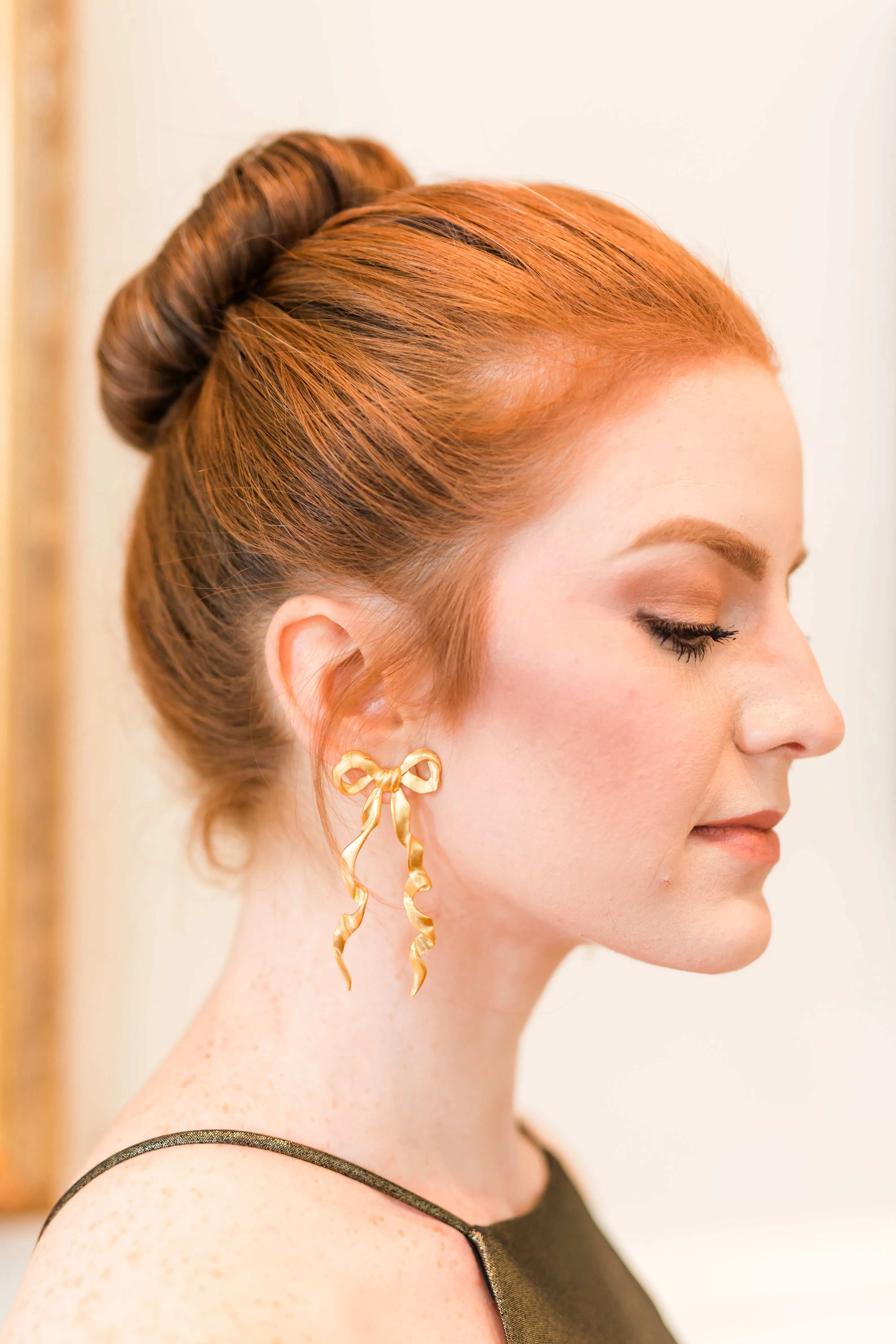 The Pink Reef elongated bow stud