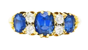Victorian 2.10 CTW Cushion Cut Sapphire Old European Cut Diamond 18 Karat Yellow Gold Antique Band Ring